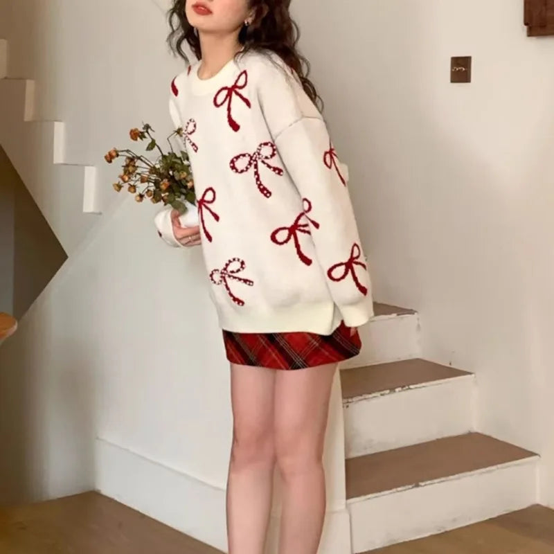 Mode strik genagelde kralen ronde hals trui voor dames in de herfst en winter Koreaanse losse