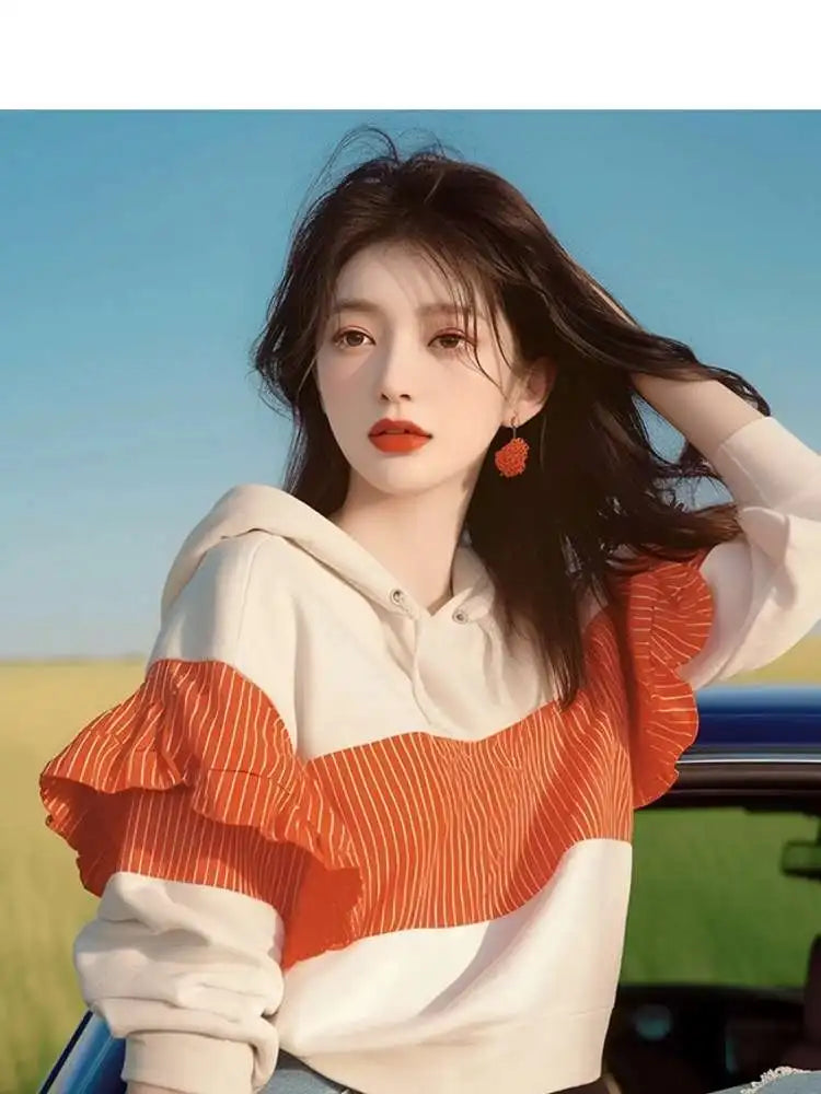 Koreaanse design niche westerse stijl top met unieke afslankende strepen en patchwork capuchontrui