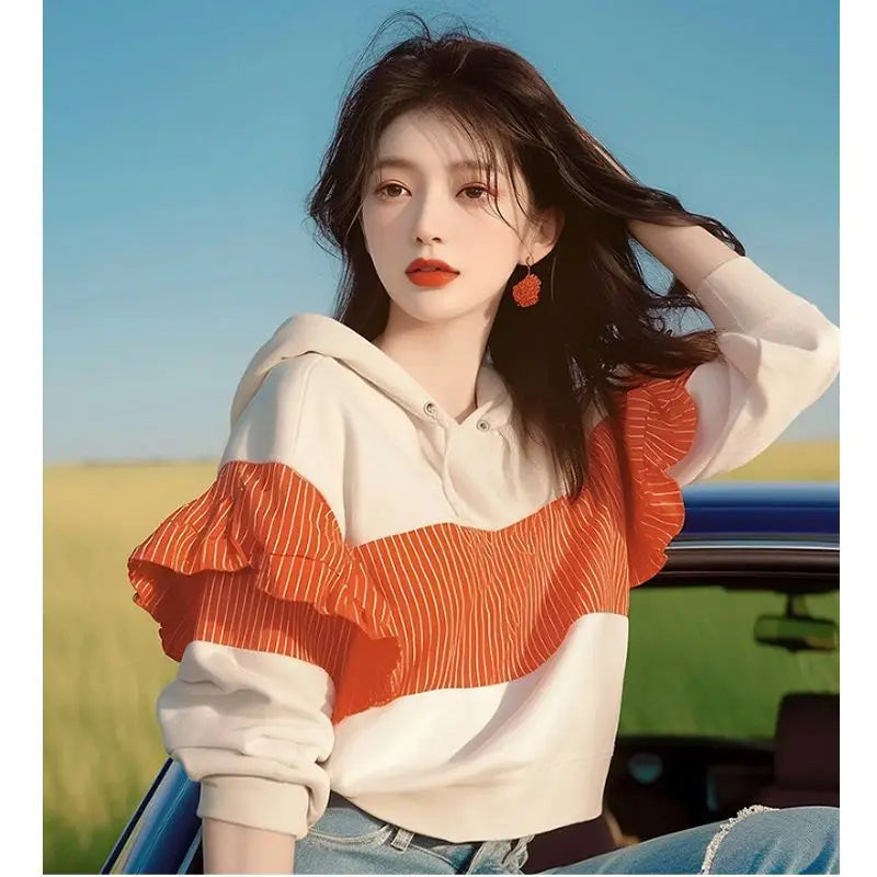 Koreaanse design niche westerse stijl top met unieke afslankende strepen en patchwork capuchontrui