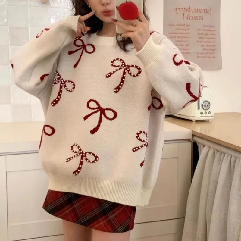 Mode strik genagelde kralen ronde hals trui voor dames in de herfst en winter Koreaanse losse